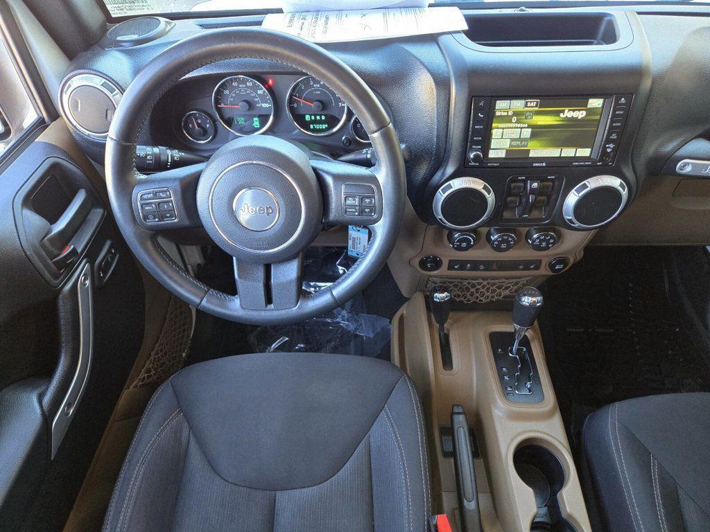 used 2015 Jeep Wrangler Unlimited car, priced at $22,599