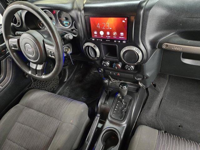 used 2011 Jeep Wrangler Unlimited car, priced at $19,385