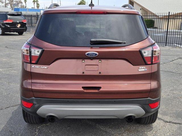 used 2018 Ford Escape car, priced at $13,999
