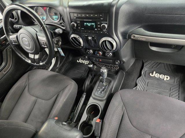 used 2013 Jeep Wrangler car, priced at $16,495