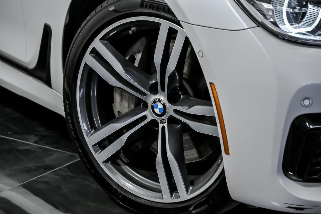 used 2019 BMW 750 car, priced at $27,995