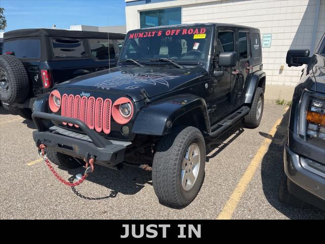 used 2009 Jeep Wrangler Unlimited car, priced at $12,900