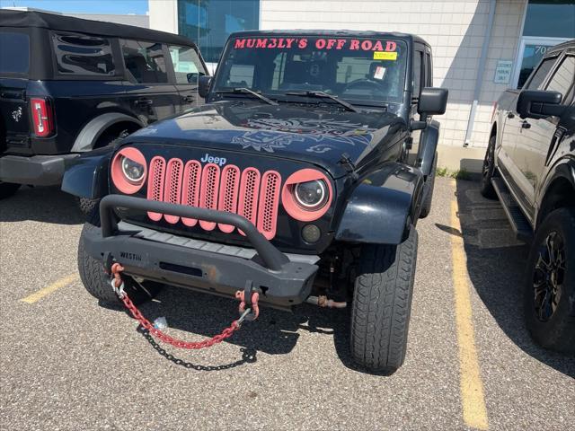 used 2009 Jeep Wrangler Unlimited car, priced at $12,900