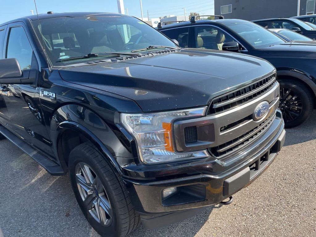 used 2018 Ford F-150 car, priced at $16,900
