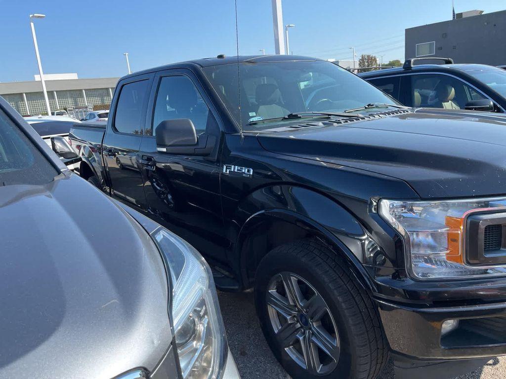 used 2018 Ford F-150 car, priced at $16,900