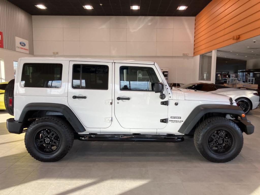 used 2015 Jeep Wrangler Unlimited car, priced at $12,900