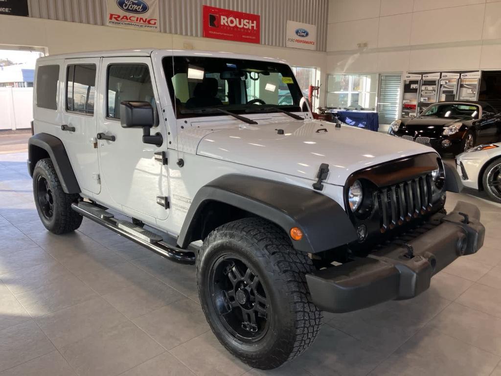 used 2015 Jeep Wrangler Unlimited car, priced at $12,900