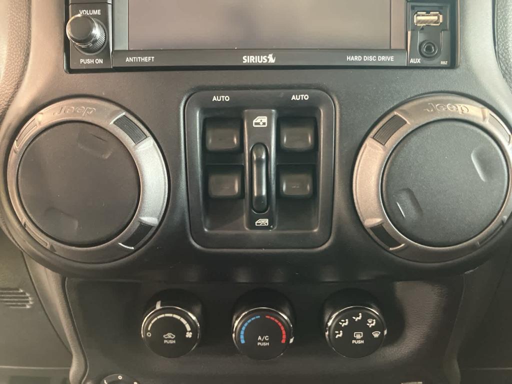 used 2015 Jeep Wrangler Unlimited car, priced at $12,900