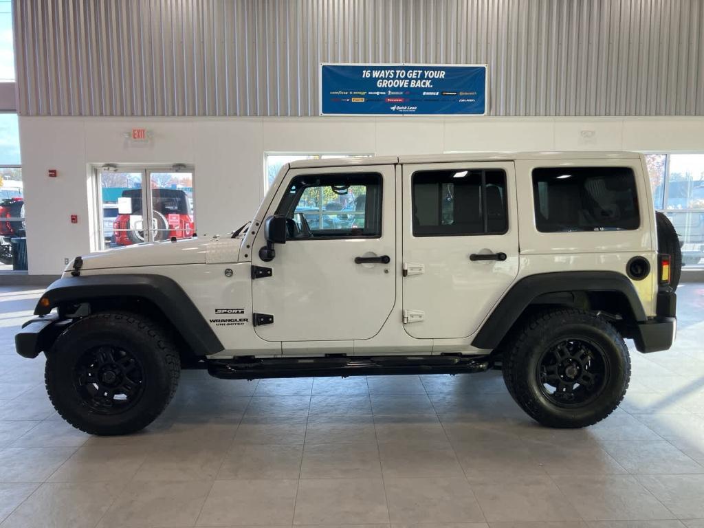 used 2015 Jeep Wrangler Unlimited car, priced at $12,900