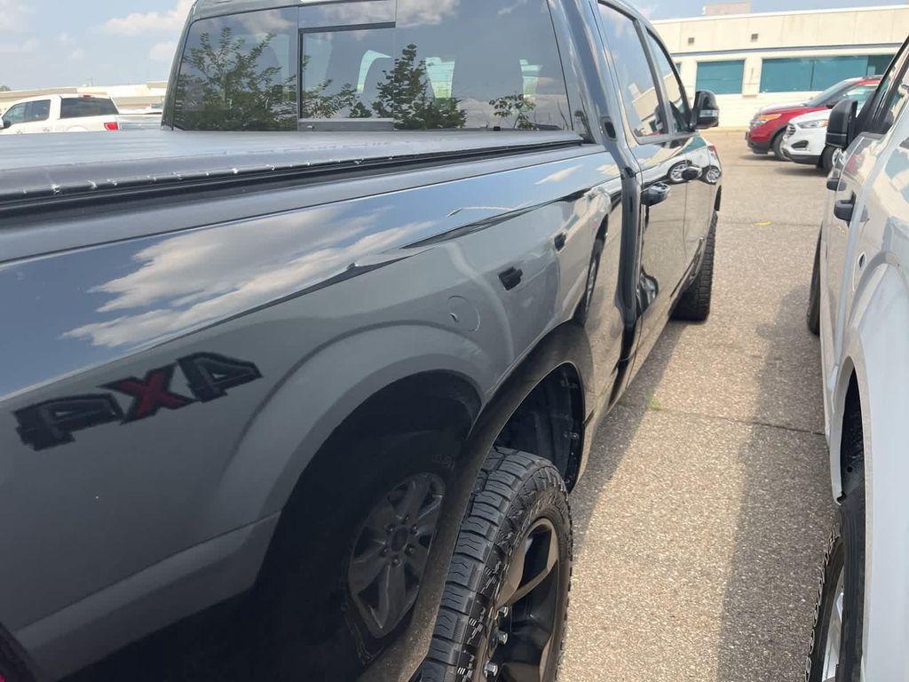 used 2019 Ram 1500 car, priced at $26,900