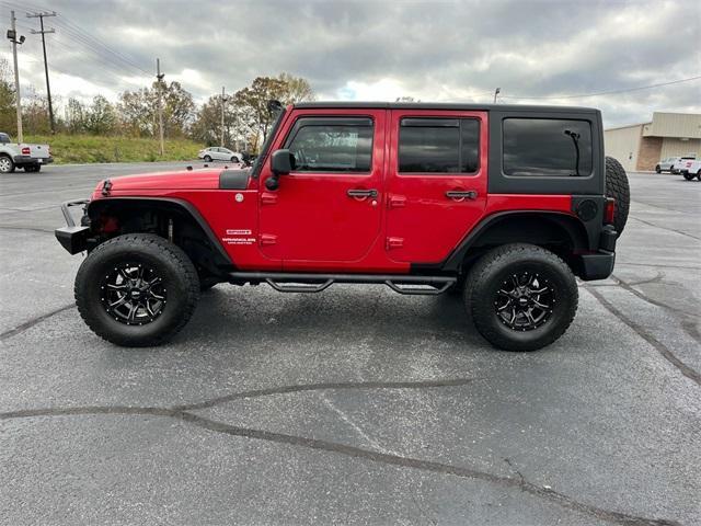 used 2011 Jeep Wrangler Unlimited car, priced at $12,995