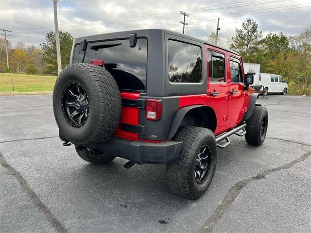 used 2011 Jeep Wrangler Unlimited car, priced at $12,995