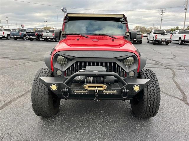 used 2011 Jeep Wrangler Unlimited car, priced at $12,995