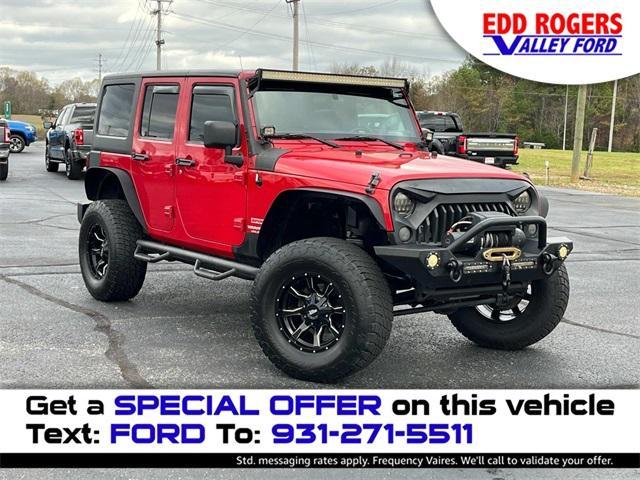 used 2011 Jeep Wrangler Unlimited car, priced at $12,995