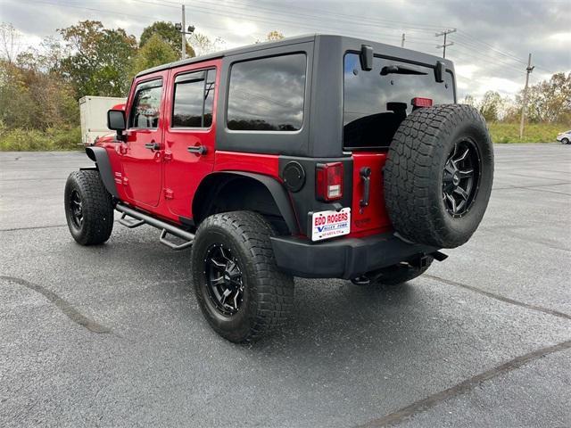 used 2011 Jeep Wrangler Unlimited car, priced at $12,995