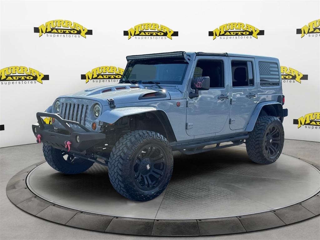 used 2013 Jeep Wrangler Unlimited car, priced at $15,995