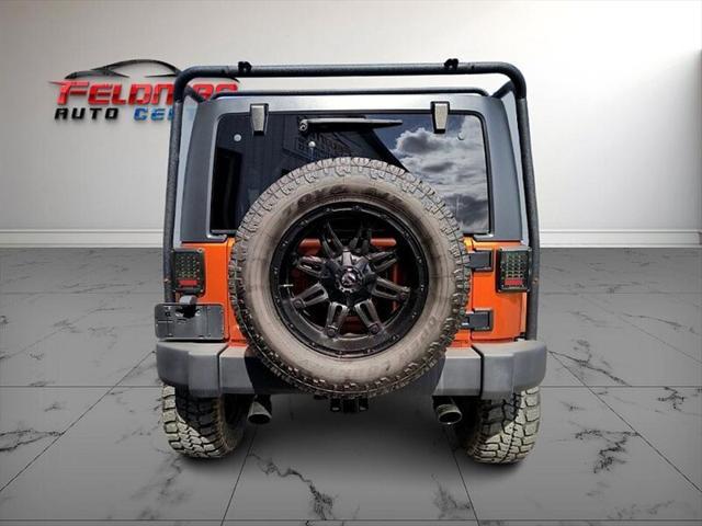 used 2011 Jeep Wrangler Unlimited car, priced at $20,950