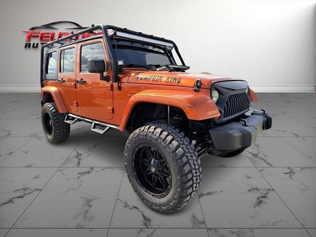 used 2011 Jeep Wrangler Unlimited car, priced at $20,950