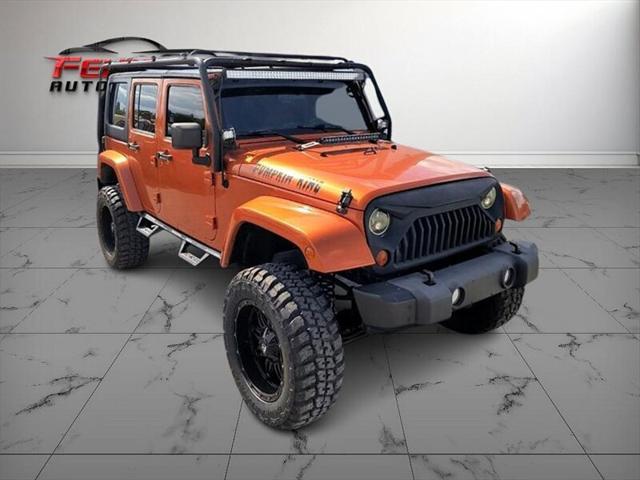 used 2011 Jeep Wrangler Unlimited car, priced at $20,950