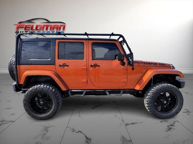 used 2011 Jeep Wrangler Unlimited car, priced at $20,950