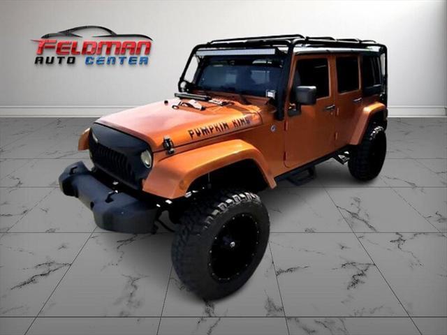 used 2011 Jeep Wrangler Unlimited car, priced at $20,950