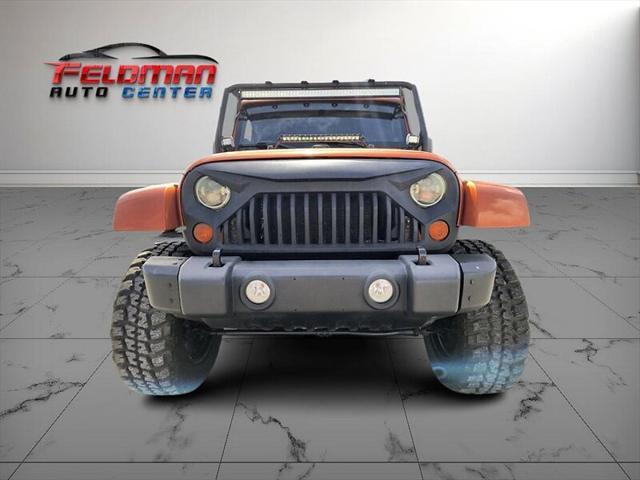 used 2011 Jeep Wrangler Unlimited car, priced at $20,950