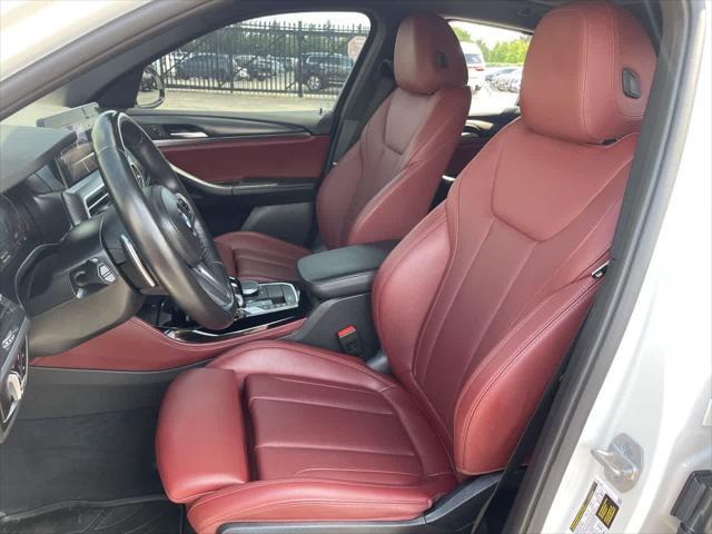 used 2023 BMW X4 car, priced at $43,487