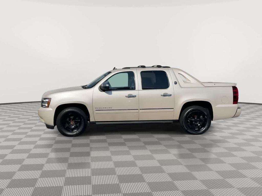 used 2013 Chevrolet Avalanche car, priced at $17,187