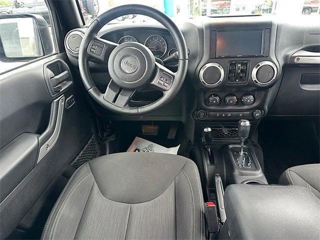 used 2015 Jeep Wrangler Unlimited car, priced at $17,612