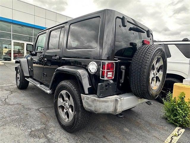 used 2015 Jeep Wrangler Unlimited car, priced at $17,612