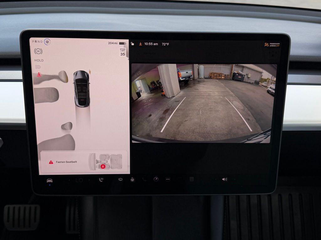 used 2023 Tesla Model Y car, priced at $27,998