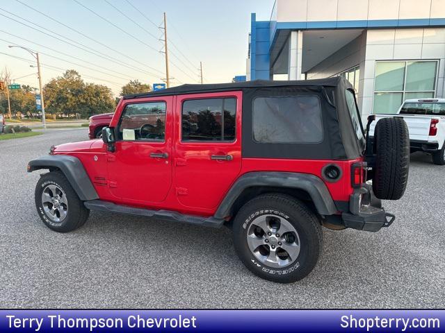 used 2017 Jeep Wrangler Unlimited car, priced at $23,172