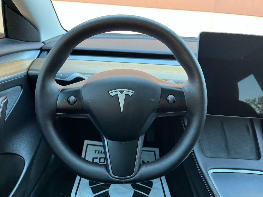 used 2023 Tesla Model 3 car, priced at $21,995