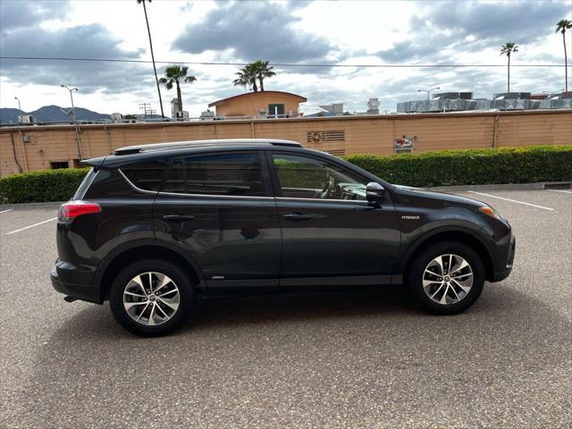 used 2018 Toyota RAV4 Hybrid car, priced at $16,999