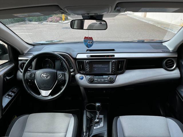 used 2018 Toyota RAV4 Hybrid car, priced at $16,999