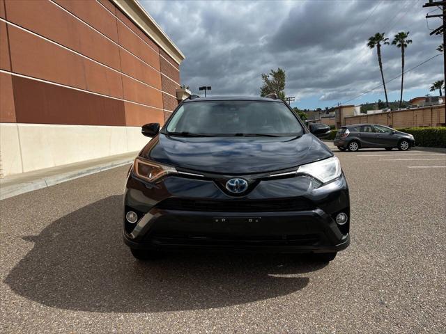 used 2018 Toyota RAV4 Hybrid car, priced at $16,999