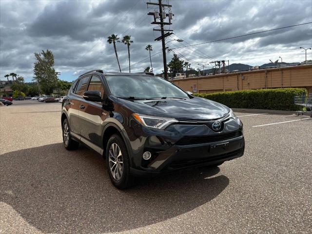 used 2018 Toyota RAV4 Hybrid car, priced at $16,999