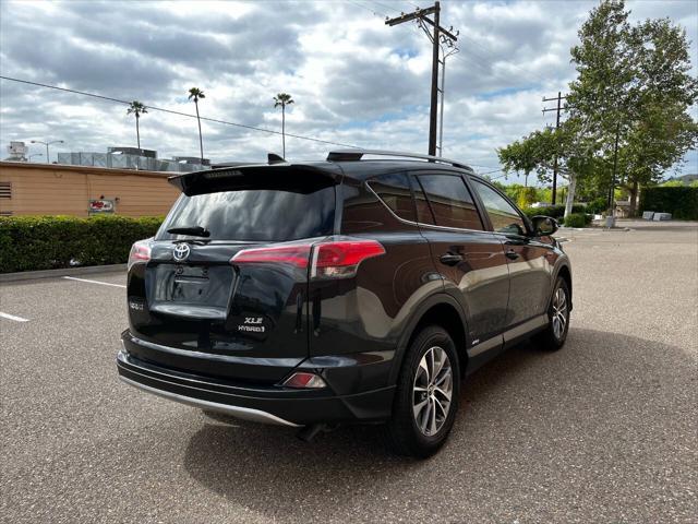 used 2018 Toyota RAV4 Hybrid car, priced at $16,999