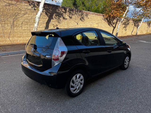 used 2014 Toyota Prius c car, priced at $9,999