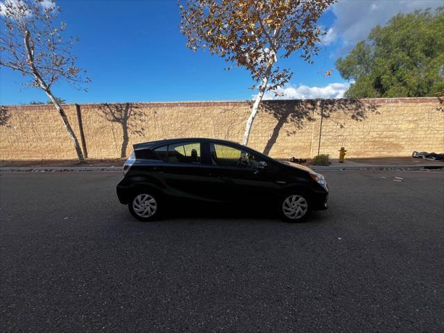 used 2014 Toyota Prius c car, priced at $9,999