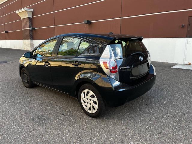 used 2014 Toyota Prius c car, priced at $9,999