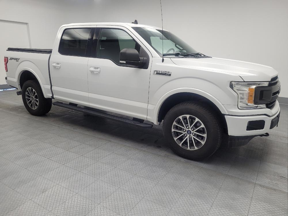 used 2019 Ford F-150 car, priced at $26,095
