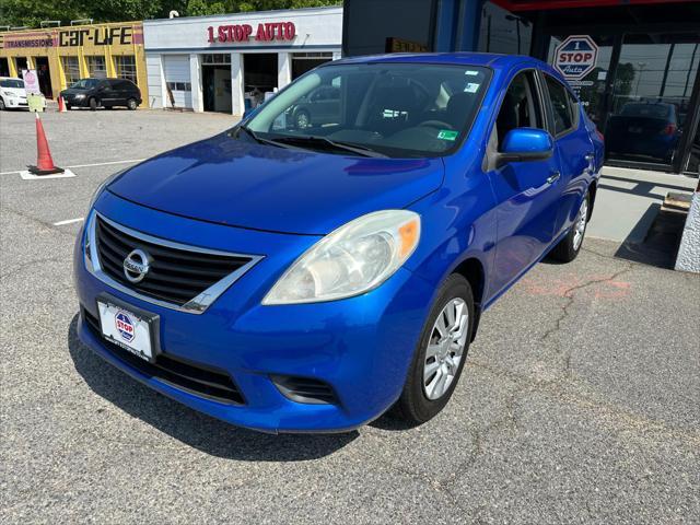 used 2012 Nissan Versa car, priced at $5,000