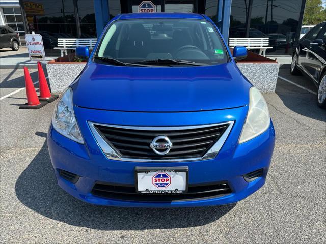 used 2012 Nissan Versa car, priced at $5,000