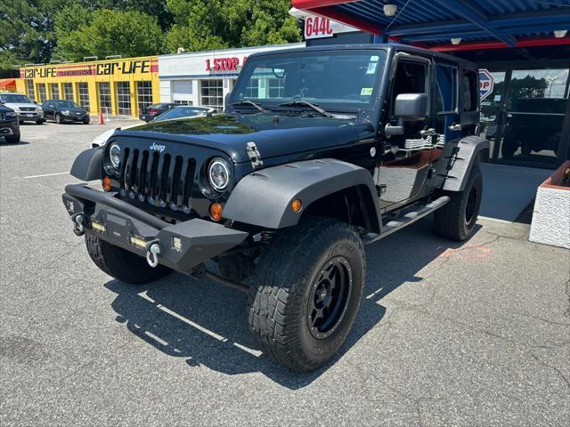 used 2011 Jeep Wrangler Unlimited car, priced at $19,000