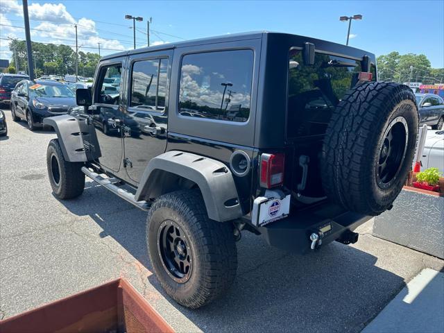 used 2011 Jeep Wrangler Unlimited car, priced at $19,000