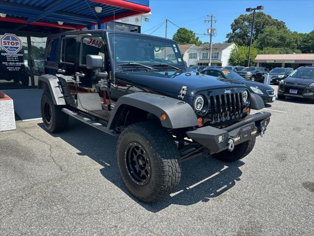 used 2011 Jeep Wrangler Unlimited car, priced at $19,000