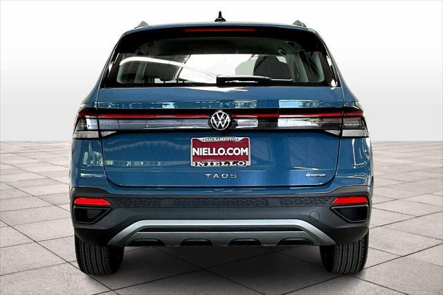 new 2025 Volkswagen Taos car, priced at $28,416