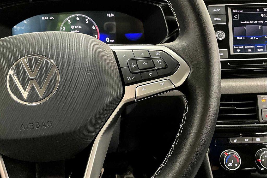 used 2023 Volkswagen Taos car, priced at $22,189