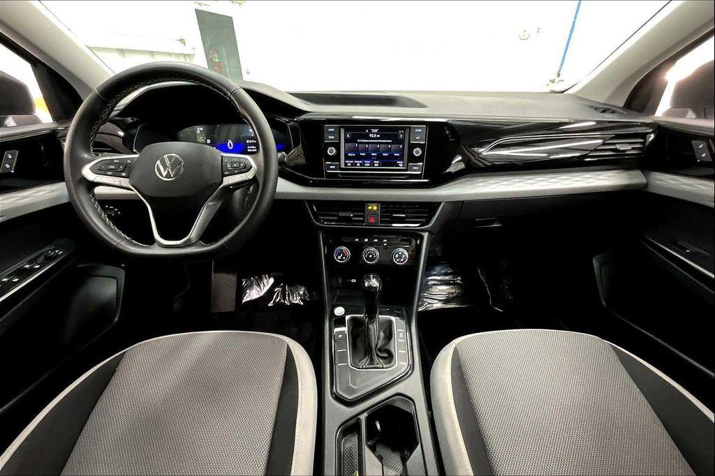 used 2023 Volkswagen Taos car, priced at $19,573
